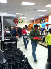 Customers rush in during Black Friday to take advantage of the sales. (Photo by Ofelia Martinez)